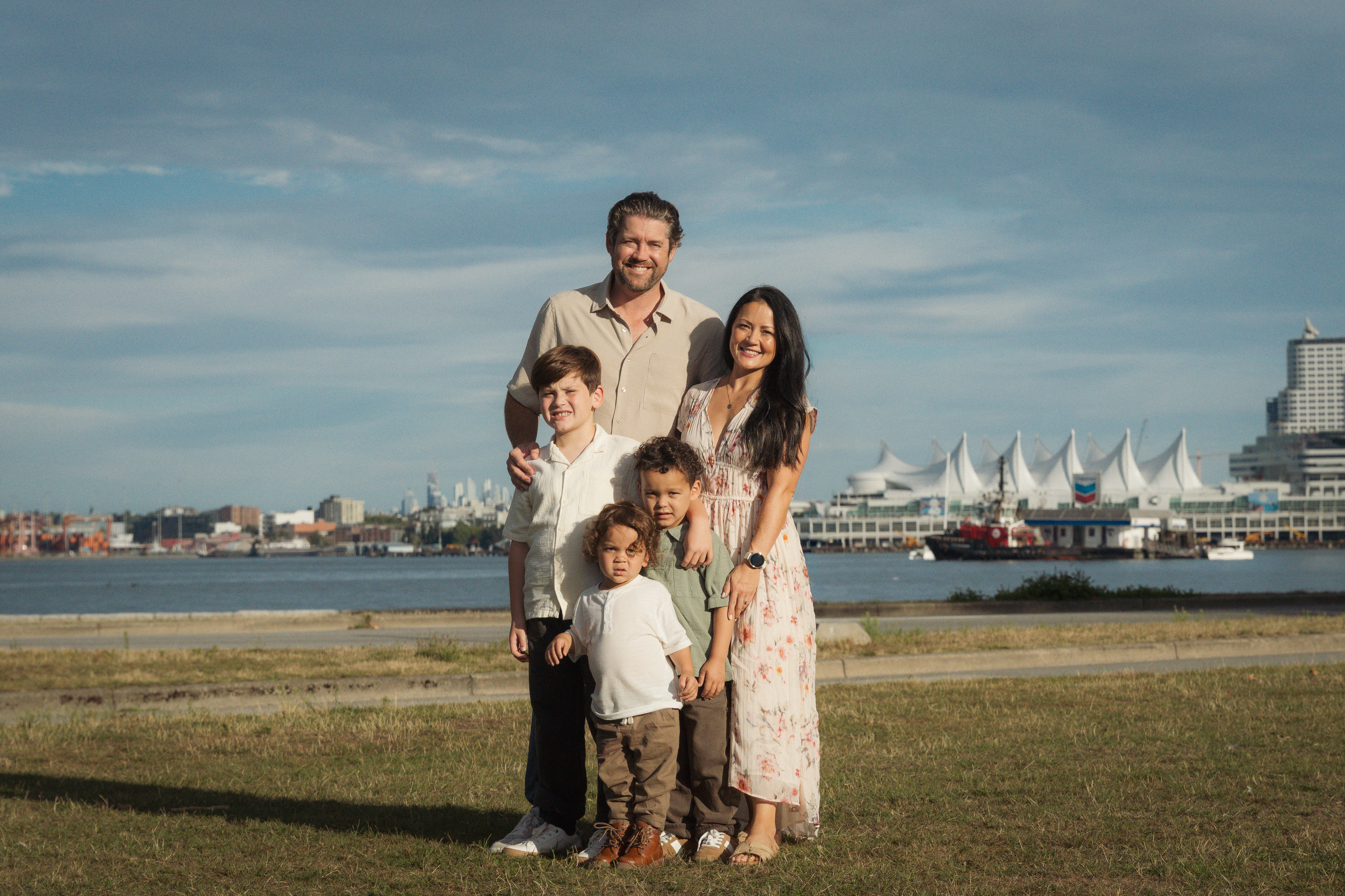 A family gathered together beside the Vancouver waterfront